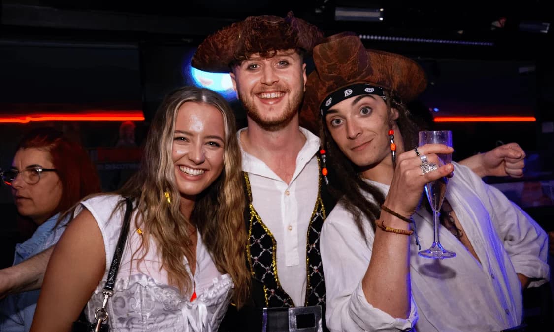 Retro DJ booth glowing in pink